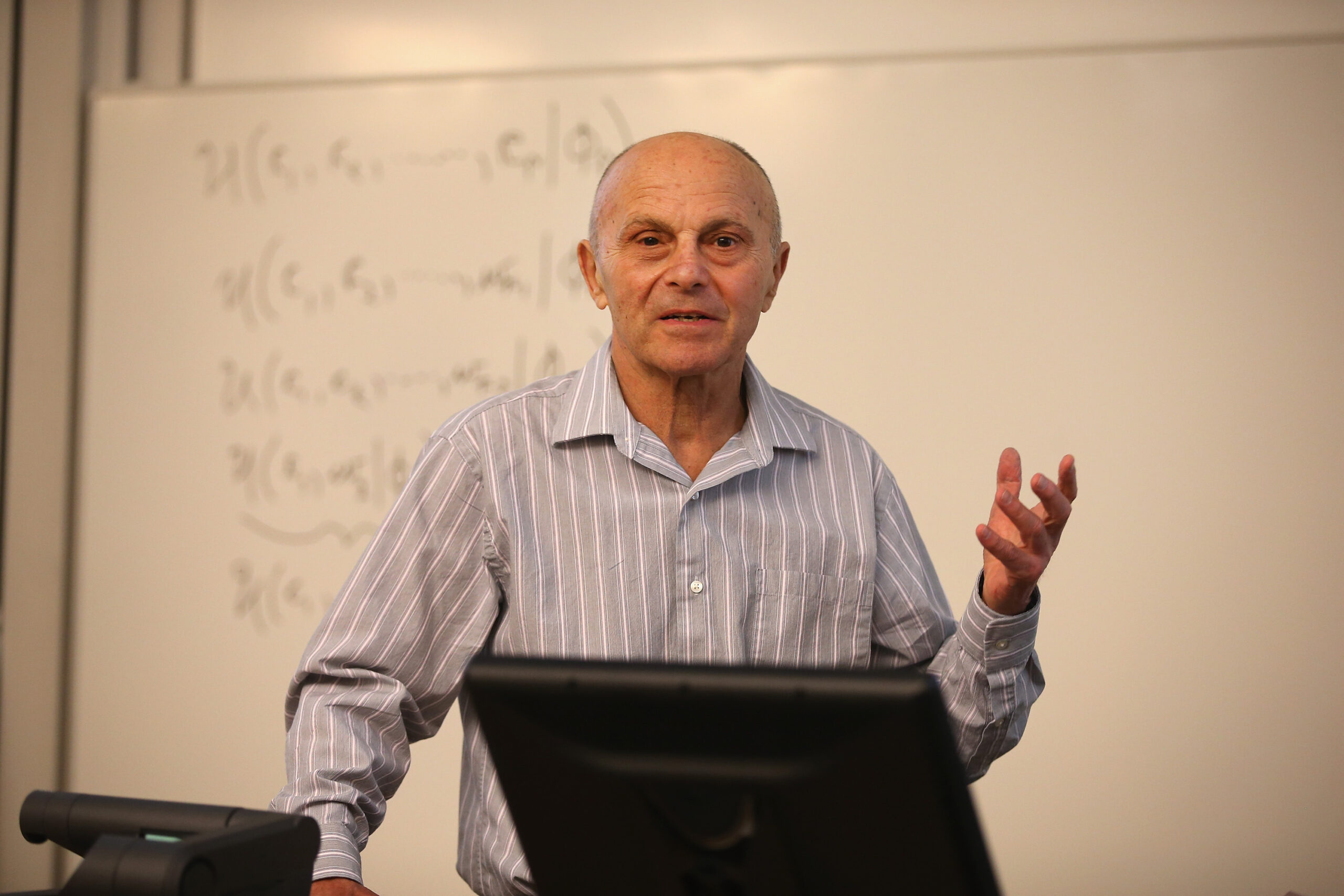 CHICAGO, IL - OCTOBER 14:  University of Chicago professor Eugene Fama speaks to students in his classroom at the university on October 14, 2013 in Chicago, Illinois. Earlier in the morning Fama learned he had won the Nobel Prize in Economic Sciences. Fama, and his U of C colleague Lars Peter Hansen and Yale University professor Robert Shiller will share the prize.  (Photo by Scott Olson/Getty Images)